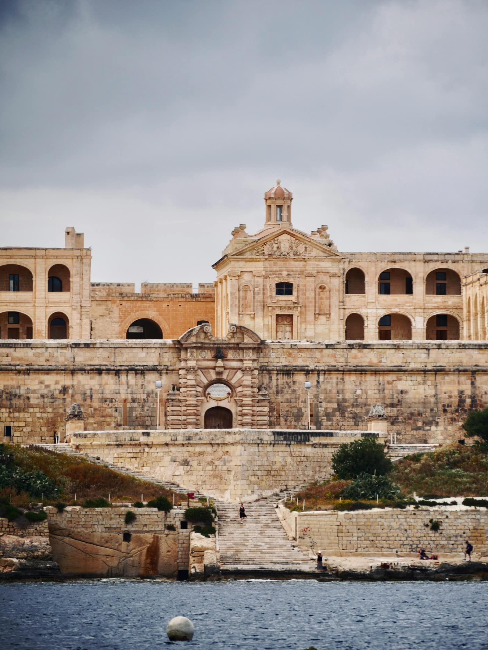 Street view in Malta with historic dome architecture