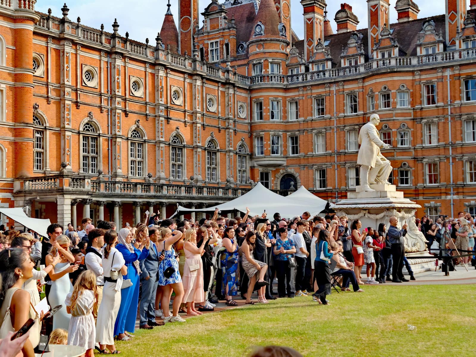 Students gathered at a university campus event in the United Kingdom